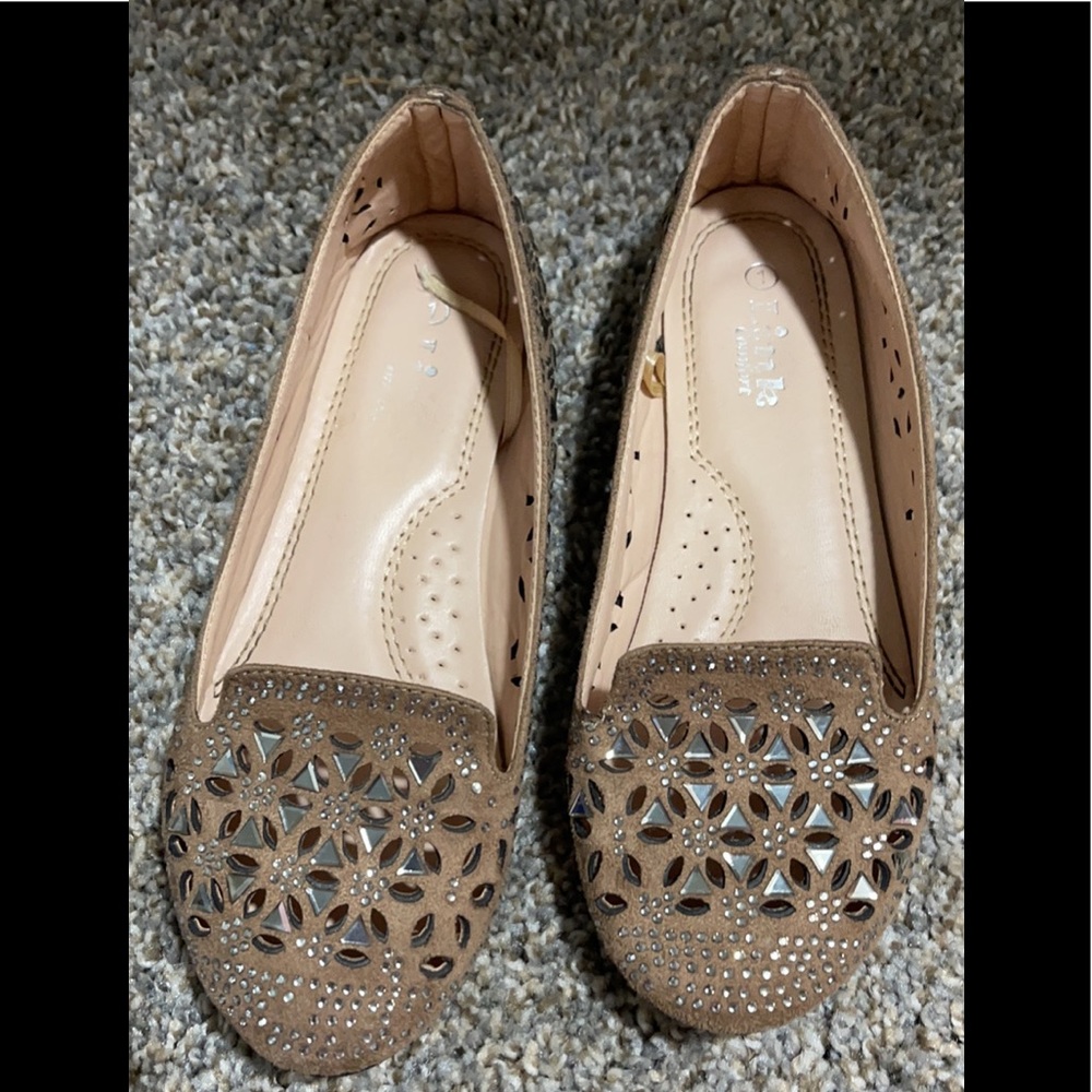 Size 1Y sparkle flats. Barely worn.
